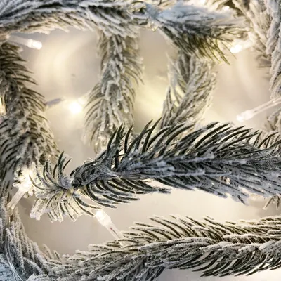 Produktbild von LED Tannengirlande 200cm mit 25 LED und Kunstschnee
