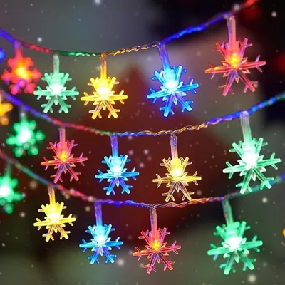 A string of colorful snowflake-shaped LED lights.