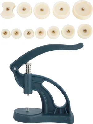 A watch press tool and a set of dies are displayed against a white background.