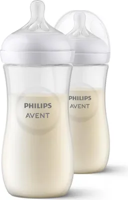 Two Philips AVENT baby bottles filled with milk, shown against a white background.