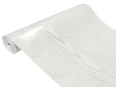 A roll of wood-effect wallpaper is shown diagonally against a white background.