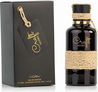 A black perfume bottle and its packaging are displayed on a white background.