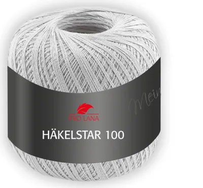 A ball of light gray yarn with a dark gray label wrapped around it.