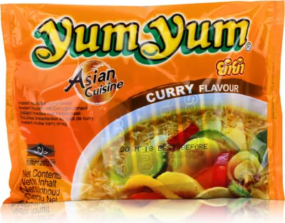 A package of Yum Yum instant noodles with curry flavor.