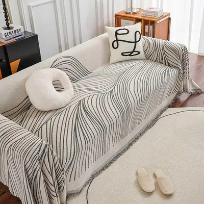 Imagen del producto de Funda para sofá de 180 x 230 cm - Protector para sofá de 3 a 4 plazas - Cubre sofá - Funda para muebles - Ideal para pelos de perros y gatos - Con flecos