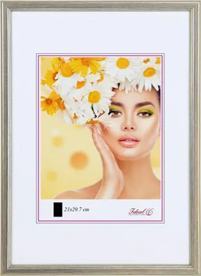 A woman with flowers in her hair is shown in a picture frame.