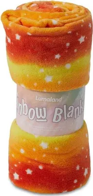 A rolled-up blanket with a rainbow pattern and stars.