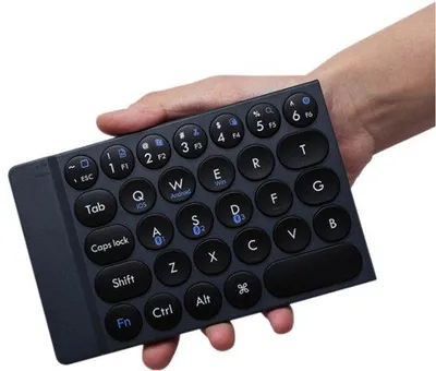 Image de Clavier Bluetooth pliable et portable avec touches rondes, clavier de bureau rechargeable ultra-fin