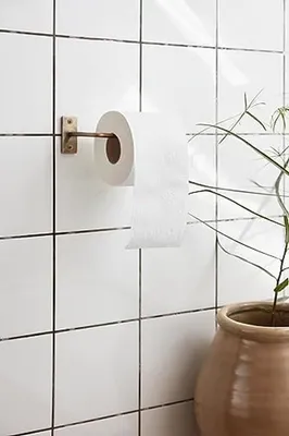 Immagine prodotto di Portarotolo in ottone anticato, dimensioni 16 x 6 x 8 cm