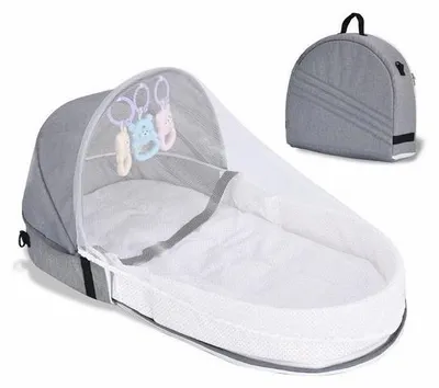 Image de Lit de voyage pliable Azomor avec jouets et moustiquaire pour bébés jusqu'à 10 mois