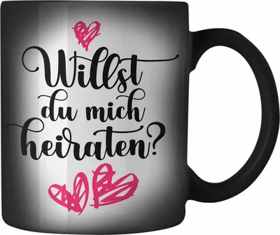 Produktbild von Trendation - Heiratsantrag Ideen Überraschung Mann Frau Heiratsantragsgeschenk Gechenke Farbwechsel Zauber-Tasse Verlobung Heiraten (Schwarz)