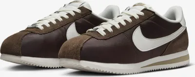 A pair of Nike Cortez sneakers.