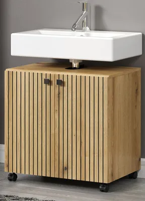 A bathroom vanity with a sink and faucet.