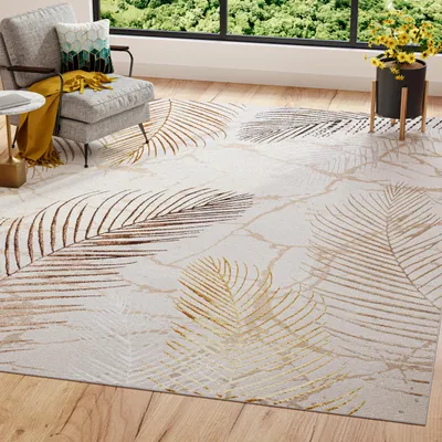 A rug with a leaf pattern is shown in a living room setting with a chair and a window.
