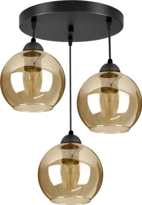 A black pendant light fixture with three amber glass globes.