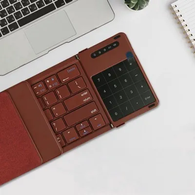 Produktbild von Faltbares Bluetooth-Tastatur – Mit Touchpad und Ziffernblock – Kabellos – Kompakt für mobile Geräte