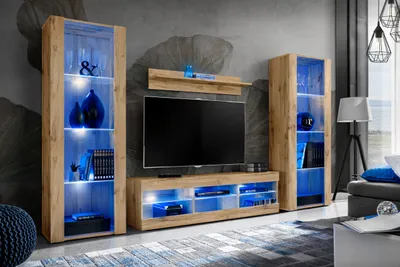 A modern living room with a TV unit and display cabinets illuminated by blue LED lights.