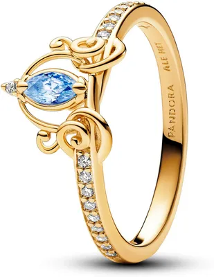 A close-up studio shot of a gold ring with a blue gemstone and clear accent stones.