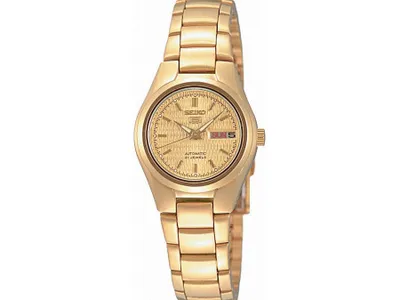 A close-up studio shot of a gold Seiko 5 watch against a white background.
