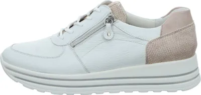 A side view of a single white women's sneaker with pink accents.