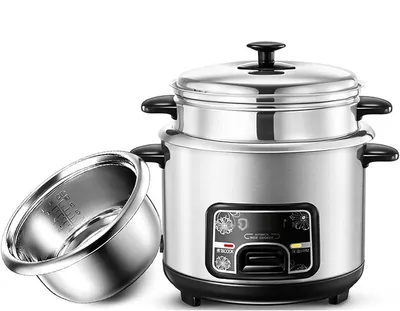 Imagen del producto de Olla arrocera con función de cocción al vapor, de 2 litros, de acero inoxidable, que incluye una espátula y un vaso medidor, ideal para la cocina