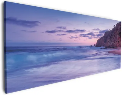 Produktbild von Wallario Premium Leinwandbild Kalifornischer Strand am Abend mit Felsenküste in Größe 80 x 200 cm
