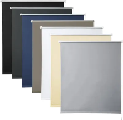 A collection of roller blinds in various colors, arranged in a staggered formation.
