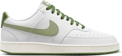 A single white Nike Court Vision Low sneaker with green accents is shown against a white background.