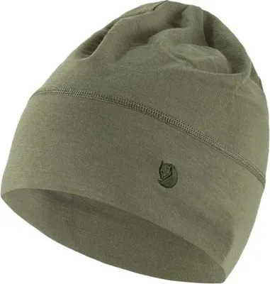 A close-up studio shot of a green beanie.