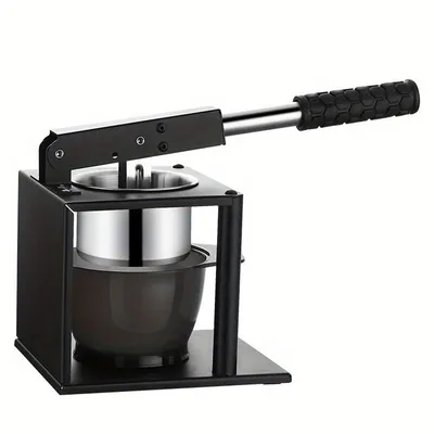 A manual fruit juicer made of thickened stainless steel is shown against a white background.