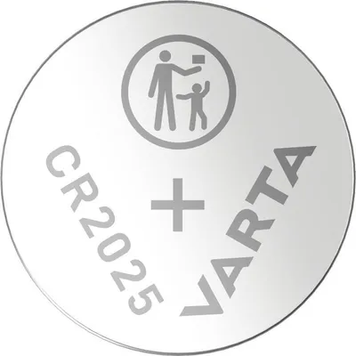 A close-up of a single silver coin-shaped battery.