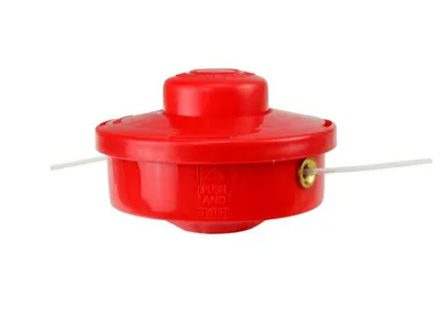 A red string trimmer head with nylon line on a white background.