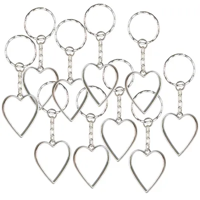 Produktbild von Logbuch-Verlag 10 Schlüsselanhänger Herzen aus Metall silber Anhänger für den Schlüsselbund Gastgeschenk Hochzeit 3 cm