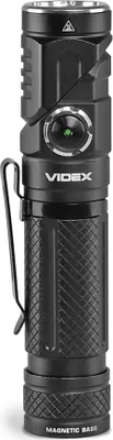 A black flashlight with a silver top and clip, set against a white background.