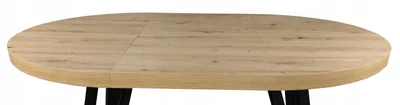 A close-up view of an oval wooden table with black legs.