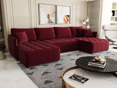 A modern living room with a large U-shaped sofa.