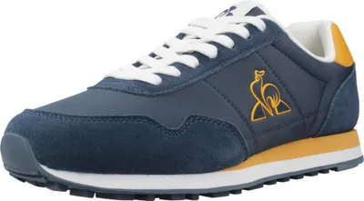 A single Le Coq Sportif shoe is shown against a white background.
