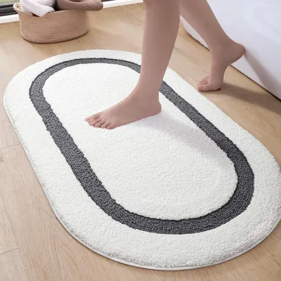 Immagine prodotto di Tappetino da bagno antiscivolo, ovale, assorbente, 44x76 cm, bianco