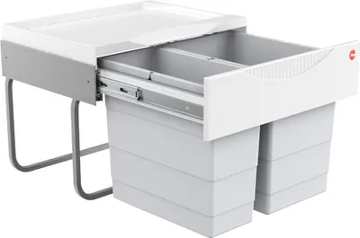A white and gray kitchen waste bin system with two compartments, shown with one drawer pulled out.