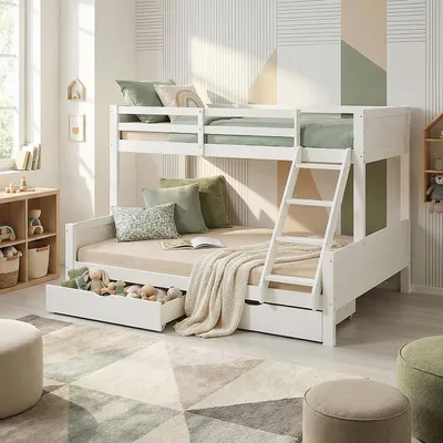 A child's bedroom with a white bunk bed, bedding, pillows, and toys.
