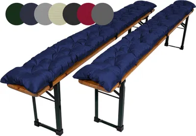 Two dark blue padded bench cushions on wooden beer garden benches.