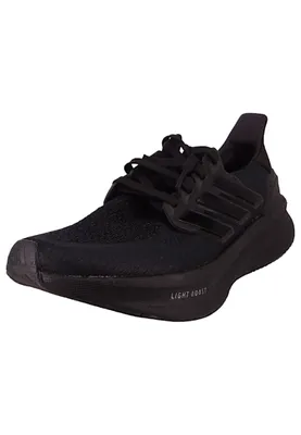 A black Adidas running shoe is shown against a white background.