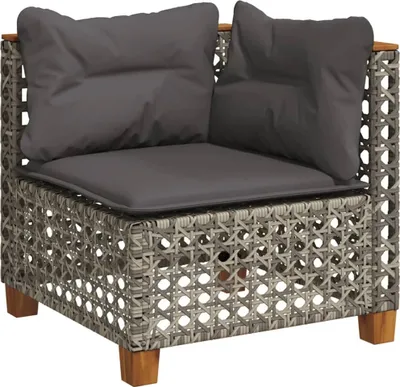 A corner sofa module with grey cushions and a woven rattan-like base, set against a white background.