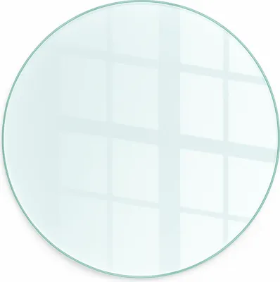 A round, clear glass plate with a light blue tint, reflecting a window pane pattern.