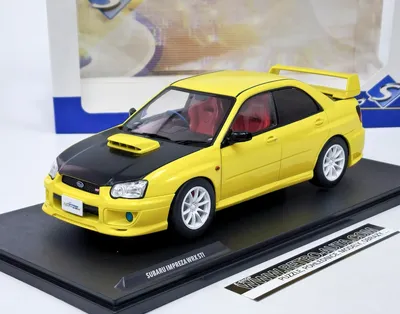 Zdjęcie produktu dla Subaru Impreza WRX STI (2003) Solido Works Yellow - SOLIDO 1:18