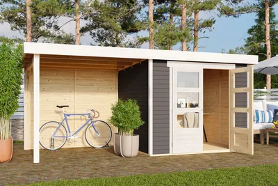 A garden shed with an attached canopy, a bicycle, and potted plants in a backyard setting.