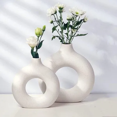 Produktbild von Unyqoos® Vasen-Set 2-tlg. Keramik beige – minimalistische Donut-Boho Blumenvase, modern, 23,3×21,5 & 19,3×18 cm, Halsöffn. 4/3,4 cm, Tisch Wohnzimmer Regal