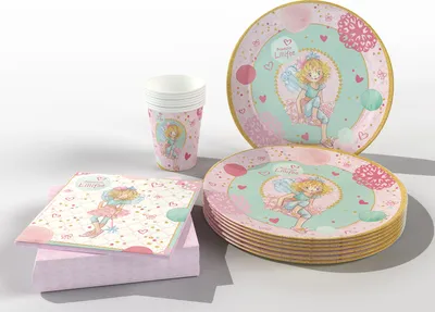 A set of disposable party tableware featuring a fairy character, including plates, cups, and napkins, arranged on a surface.