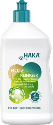 A white bottle of HAKA Holzreiniger with green and gold labels.