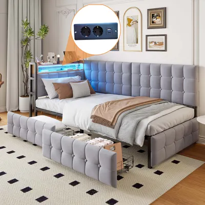 A modern daybed with storage and LED lighting, set in a bedroom.